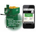Green ball machine with ball container and smartphone displaying workout tracking app on a white background