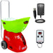 Red and green pickleball machine with remote control and power adapter on a white background