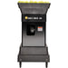 Tennis ball machine with yellow balls on a white background