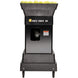 Tennis ball machine with yellow balls on a white background